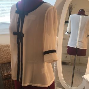 Cream top, royal blue trims